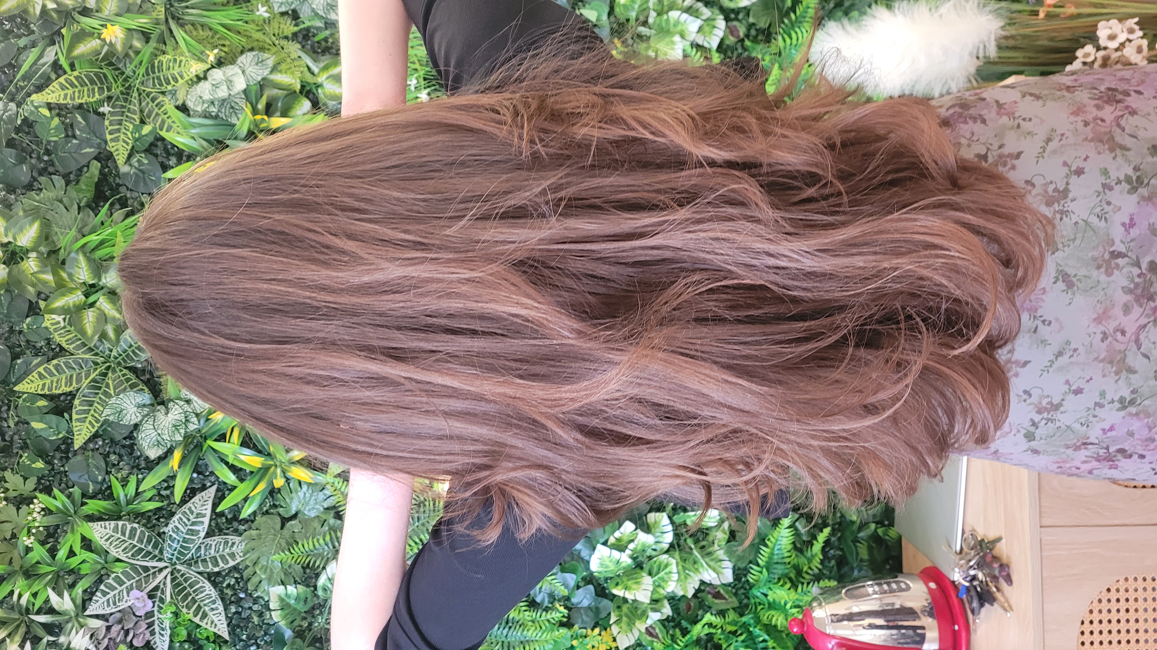 Long soft brunette waves at The Loft Hair Studio