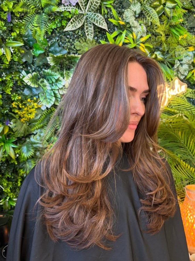 Brunette balayage with long face-framing layers at The Loft Hair Studio