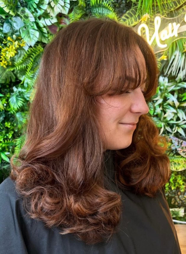 Auburn layers with a curtain fringe